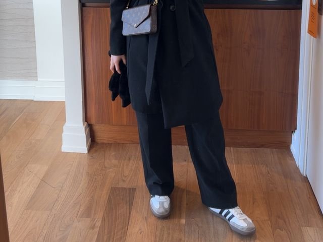 Editor Meaghan Kenny in her white Samba OG sneakers