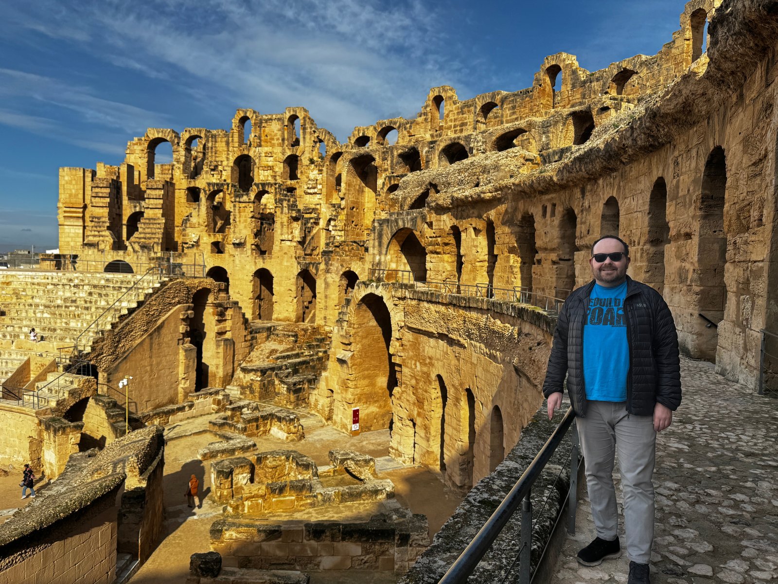 Phil takes in the view at the top level of the El Djem amphitheatre