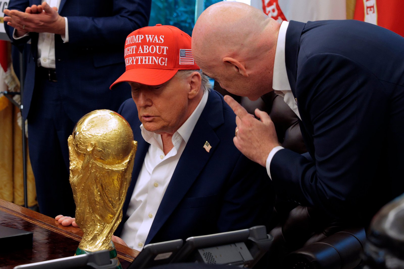 President Donald Trump with the FIFA World Cup trophy, in the Oval Office. The U.S., Canada, and Mexico will host the World Cup in 2026