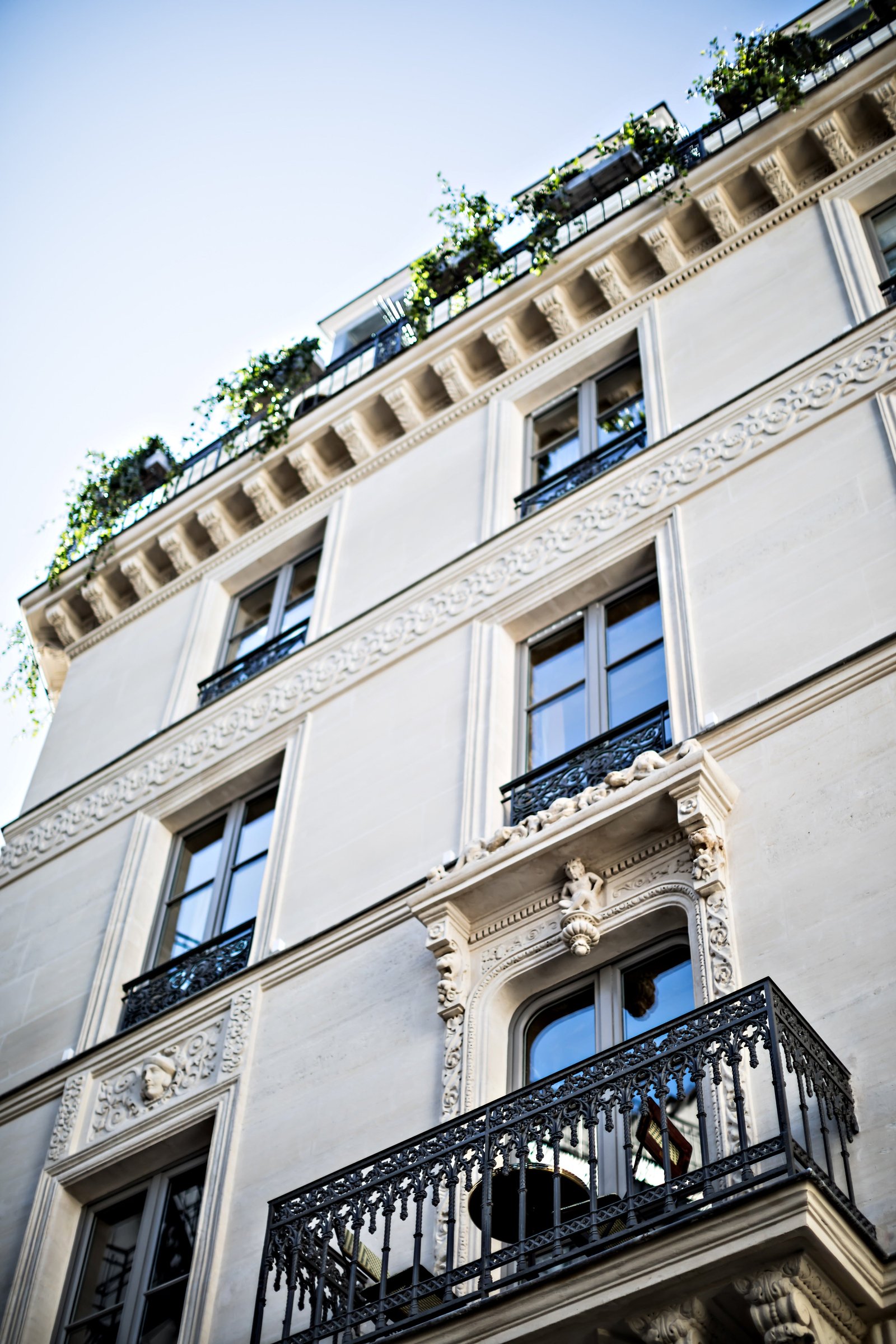 Windows from the Hotel Providence provide a wistful view of the bustling 11th arrondissement
