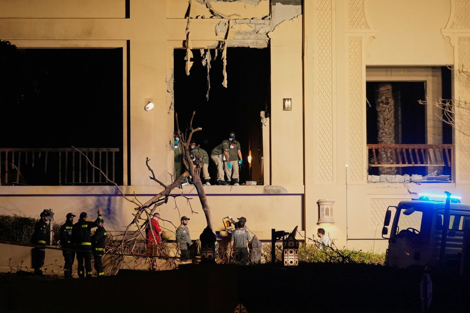 Firemen and rescue workers inspect the site of an explosion at the Fairmont The Palm Hotel in Dubai, United Arab Emirates, on Saturday, February 28, 2026. The hotel was hit by an Iranian drone