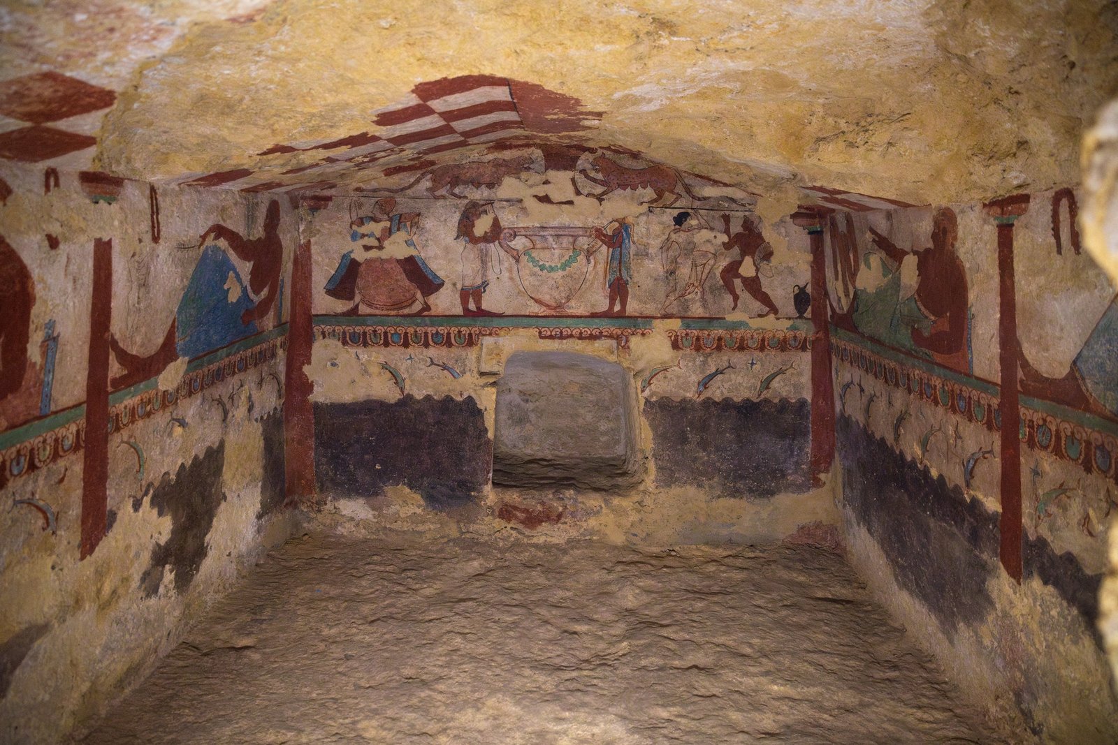 An ancient wall painting inside an Etruscan tomb in Tarquinia