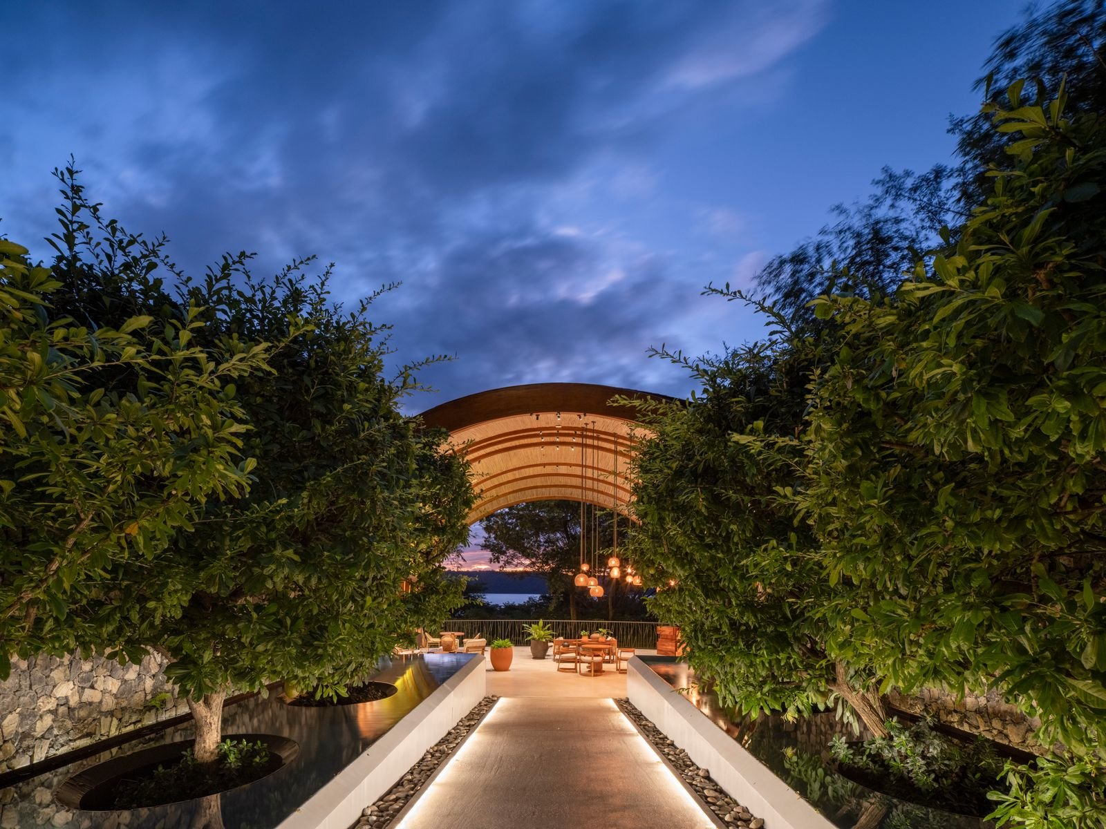 Image may contain Garden Nature Outdoors Indoors Interior Design Scenery Terrace Architecture Building and House