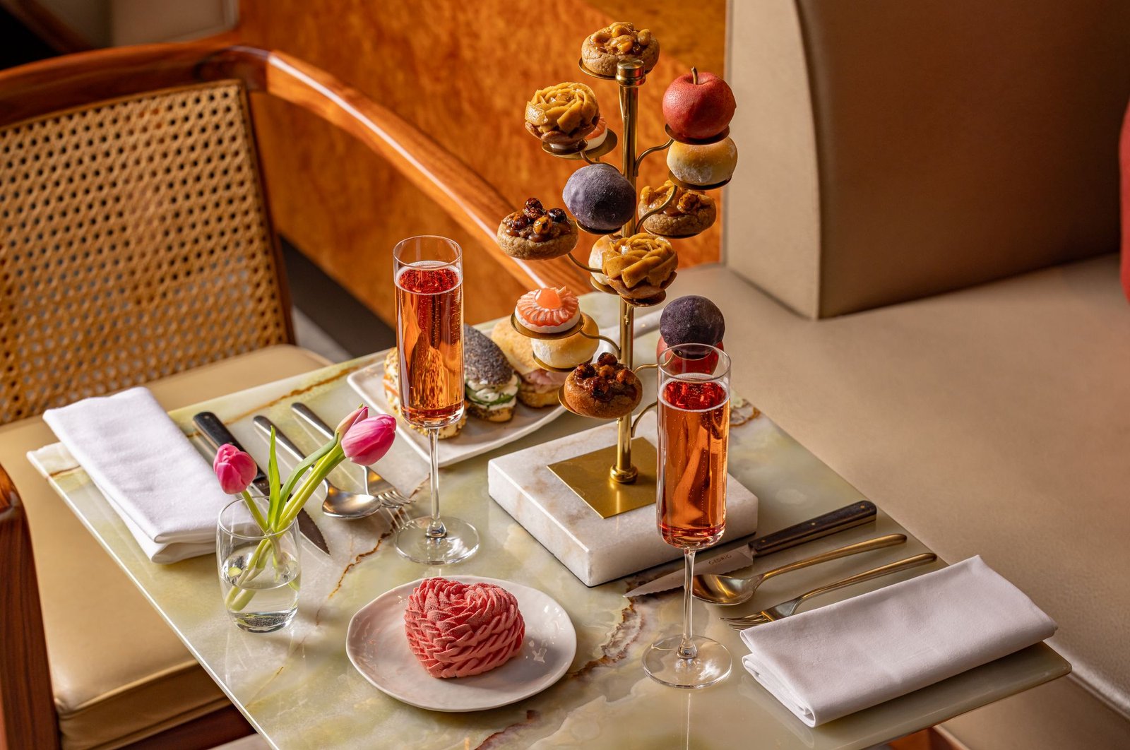 That apple poised at the top of the afternoon tea tower is not fruit – it’s actually a cake