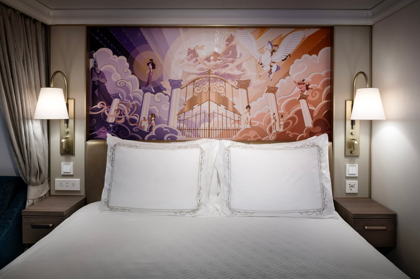 Each cabin aboard Disney Destiny has its own character headboard with themes including Hercules and Mulan