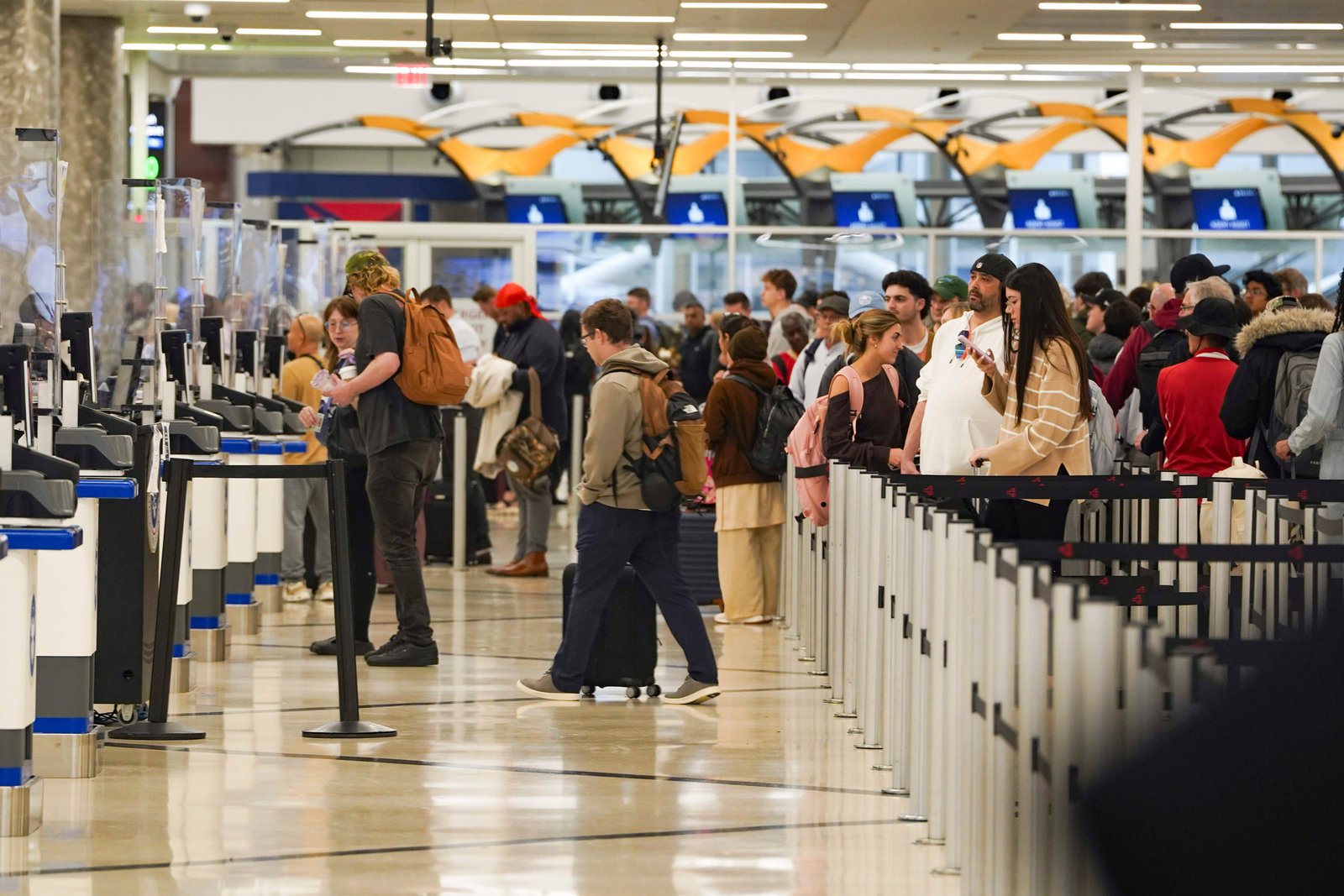 Security lines have snaked around airport terminals as the DHS shutdown wreaks havoc on flights