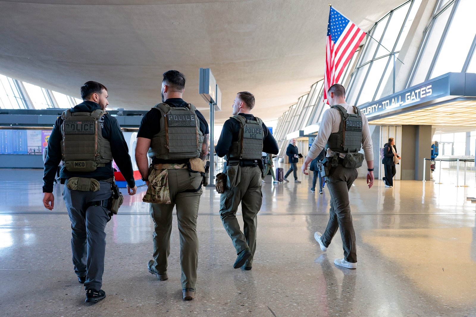 ICE agents patrol Dulles International Airport. Trump says they’re in place to provide security, but they can’t screen passengers or run X-ray machines