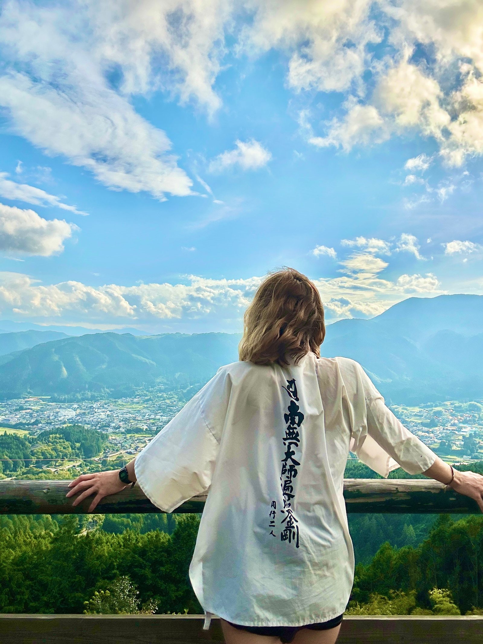 Samantha wearing her white robe on the pilgrimage at Kumakogen, Sugo