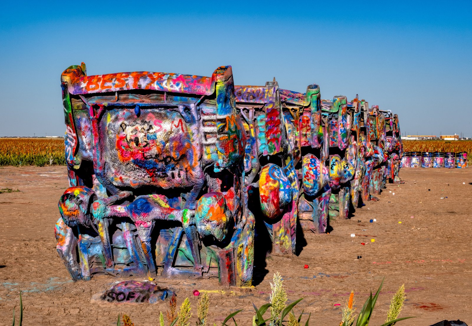 Cadillac Ranch, created in 1974 by the art group Ant Farm, features 10 classic Cadillacs buried nose-first in the ground. It’s a Route 66 must-visit