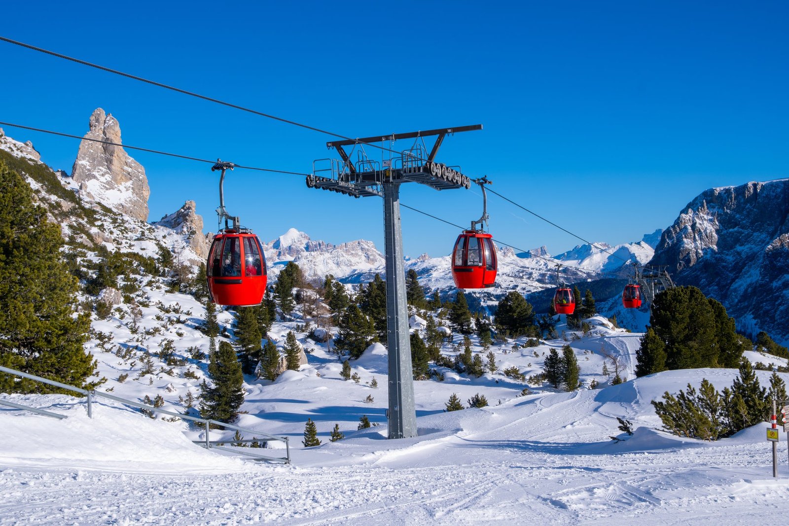 Colorful cable cars in Colfosco in Italy’s Dolomites