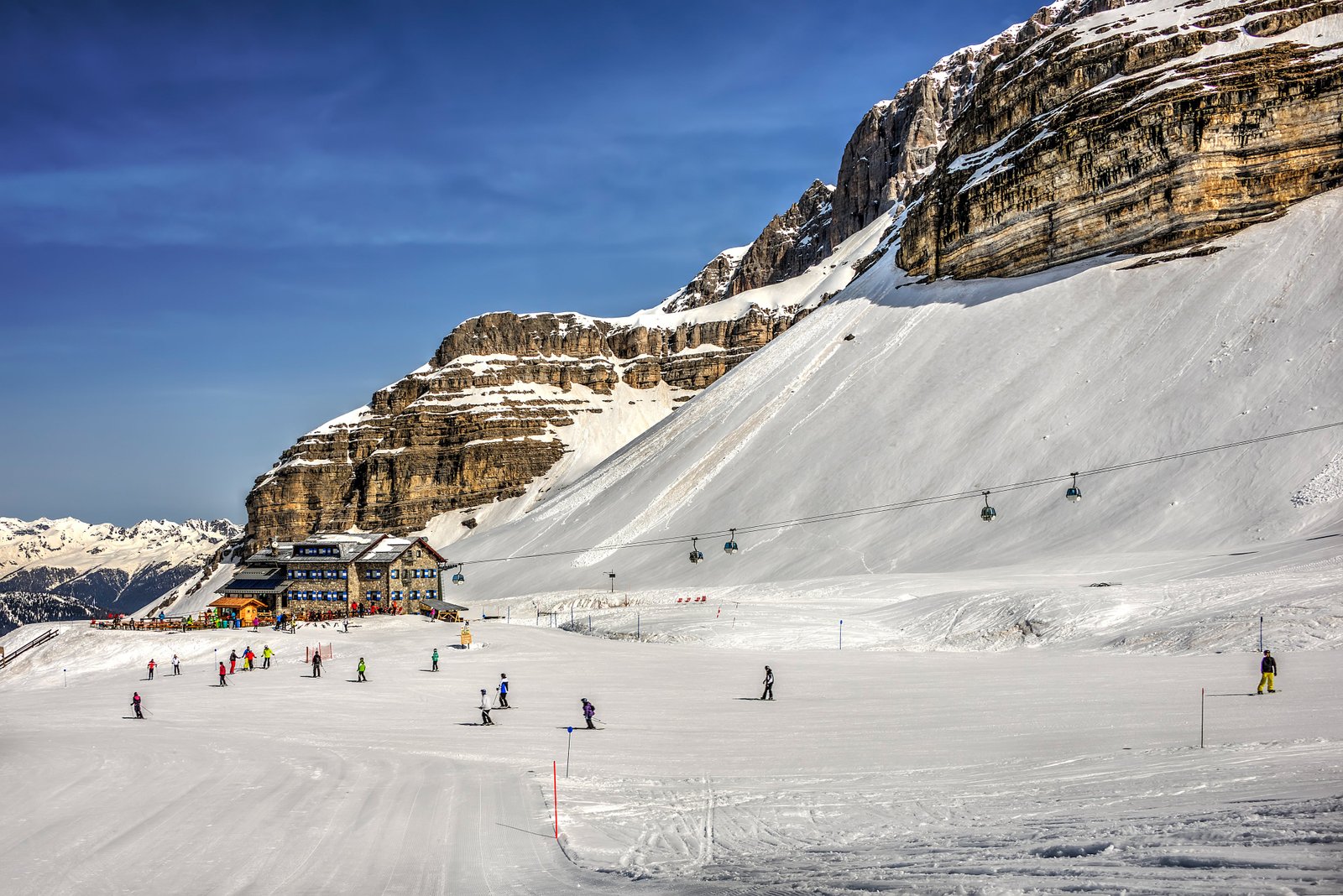 People ski at the resort of Madonna di Campiglio in the Dolomites