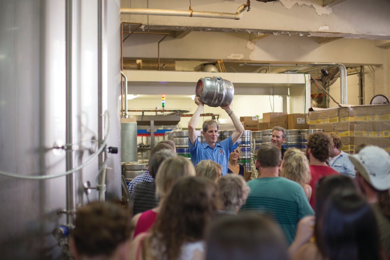 Visitors take a tour of Milwaukee's Lakefront Brewery, one of the city’s lead craft brewers
