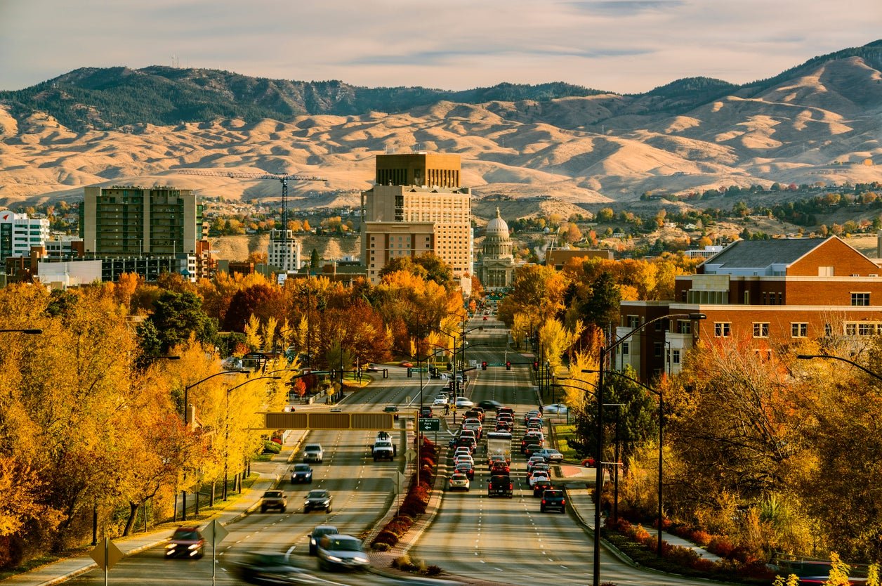 Boise has a tree-lined downtown with the foothills of the Rockies rising beyond the city
