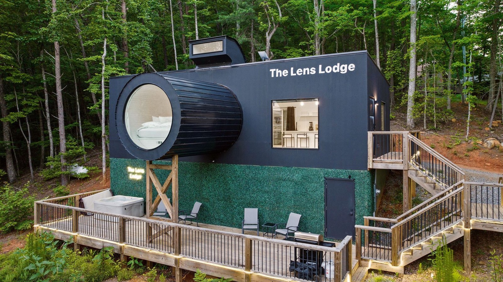 The bed in this unique camera-shaped lodge is positioned in the ‘lens’