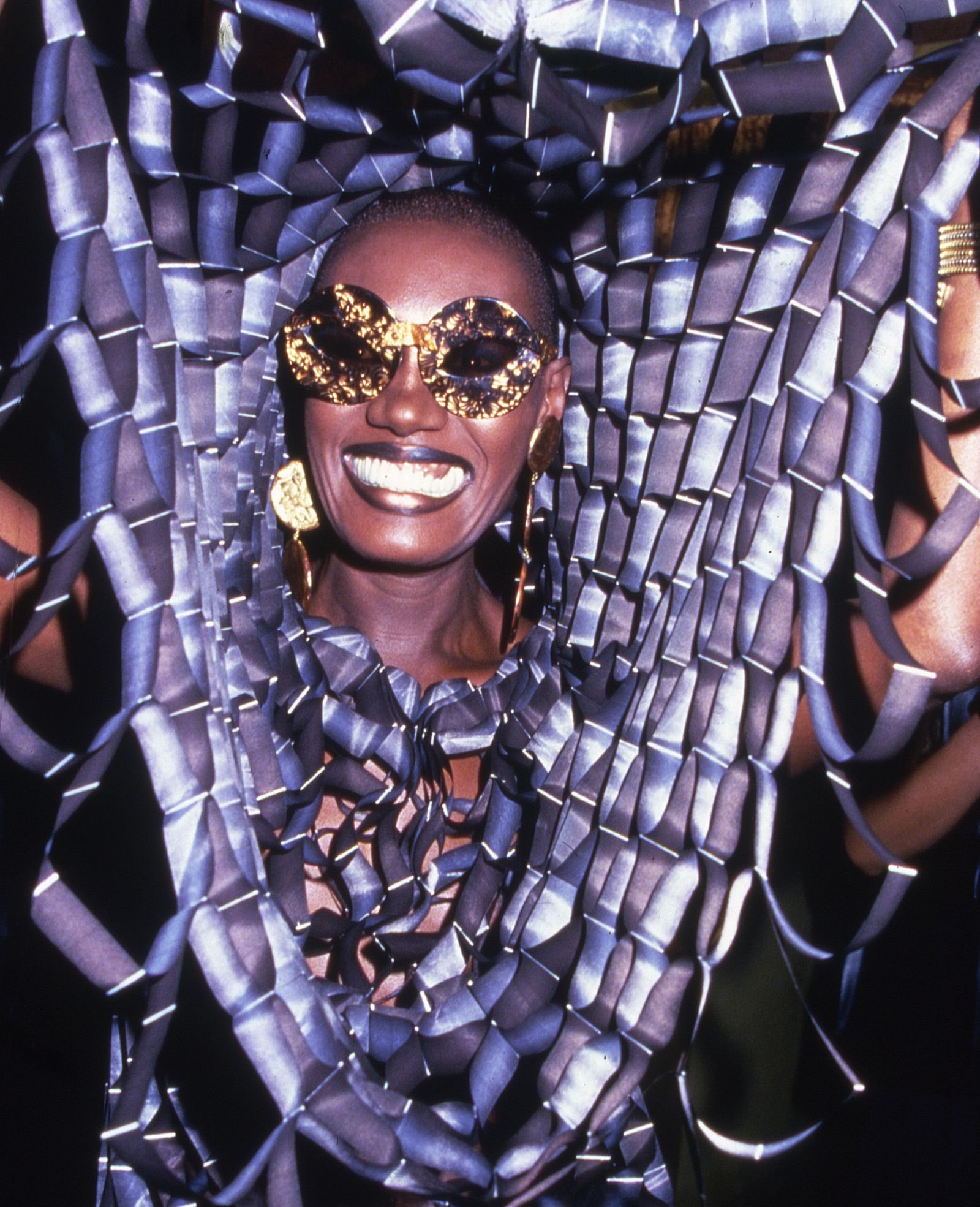 Image may contain Grace Jones Accessories Sunglasses Face Head Person Photography Portrait Carnival and Happy