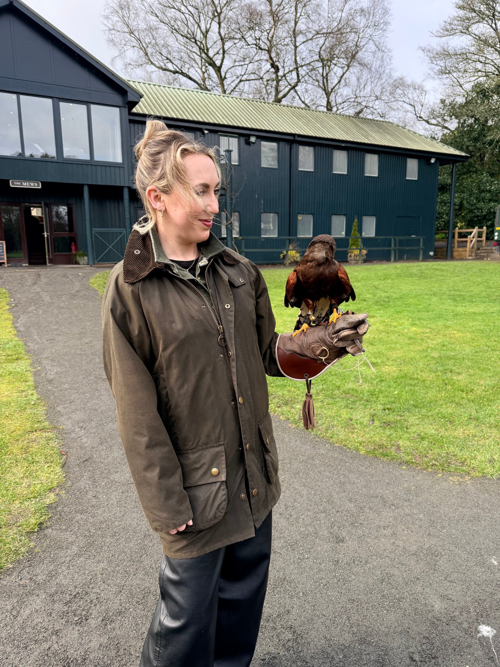 Helen taking part in falconry at Gleneagles