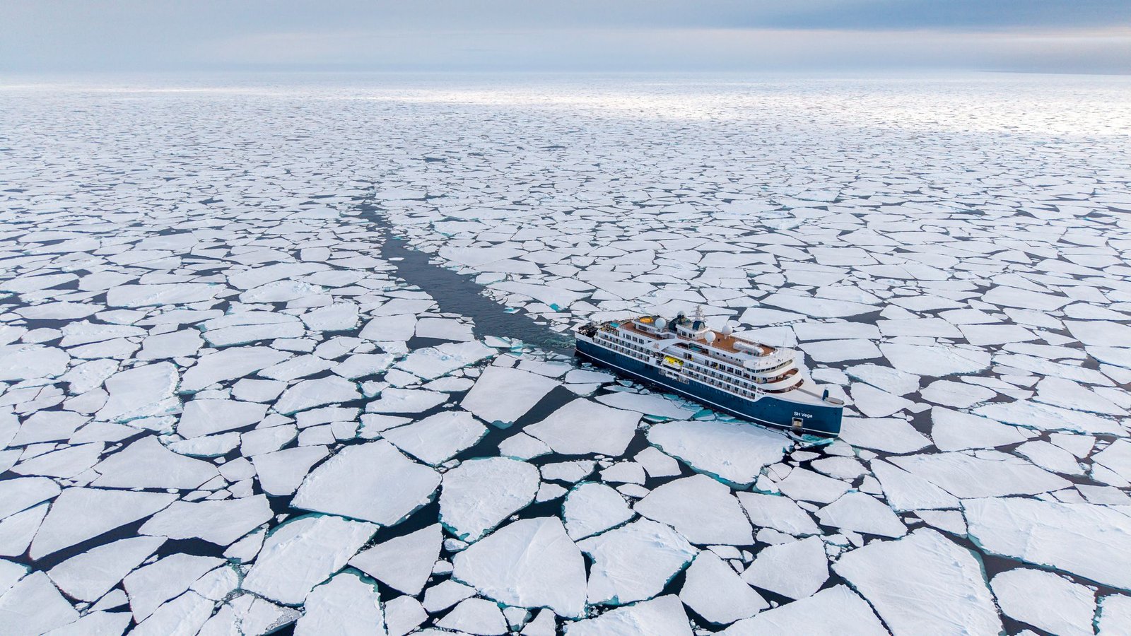 Swan Hellenic cruise ship, SH Vega, navigates pack ice in Antarctica