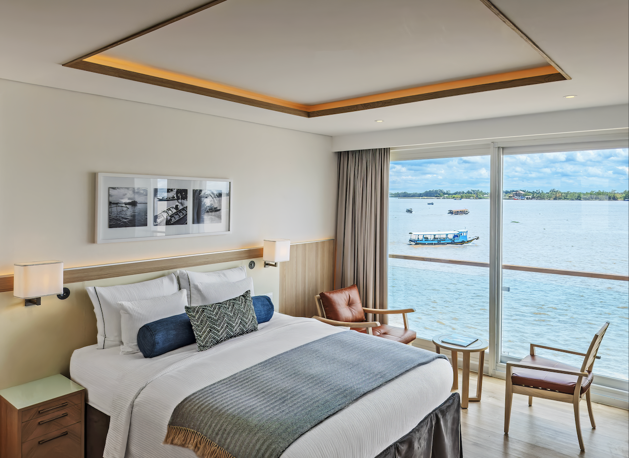 Floor-to-ceiling windows in the staterooms of the Viking Tonle provide endless views of the Mekong